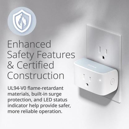 White electrical outlet with safety features text on a gray background